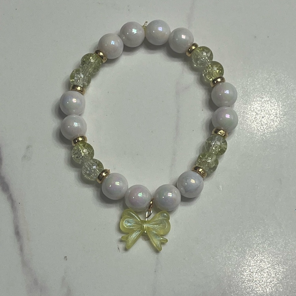 White and yellow Beaded Bracelet with Bow Charm
